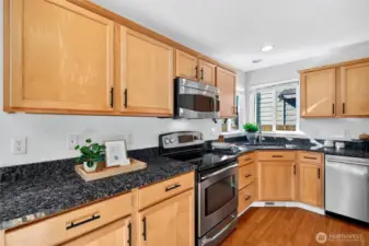 Enjoy granite countertops and stainless steel appliances