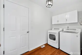 Laundry room conveniently just inside garage