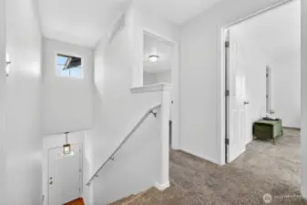 Upstairs you'll find 4 bedrooms and 2 full bathrooms