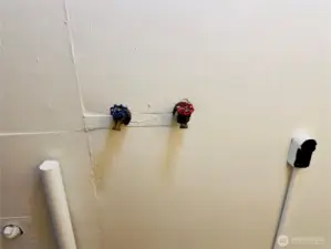 Plumbed for washer and electrial for dryer.