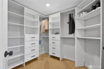 Walk- in closet in Primary Suite with built ins