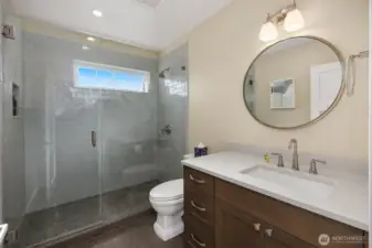 Main floor bathroom, adjacent to bedroom.