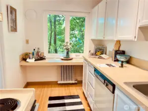 The kitchen has wonderful natural lighting and privacy.
