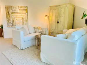 The wall to wall carpet likely has the orginal hardwood floors underneath that have been protected since the 80's