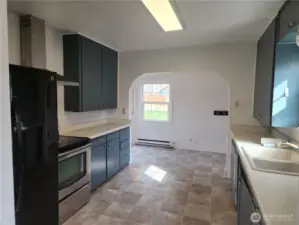 View of the kitchen, you can see the area for a small dining area.