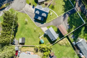 Vacant lot fronts on Evergreen and the shop fronts on Budd
