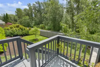 Freshly painted front entry deck overlooking your spacious front yard.