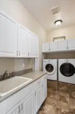 Laundry with utility sink and great storage