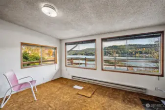 Living room; lovely view of lake and surrounding area.