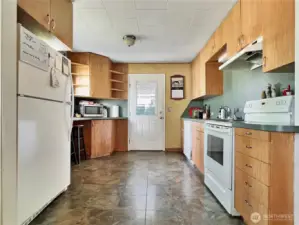 Kitchen open to dining and living area
