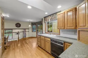 Kitchen w/premium finishes & generous cabinetry.