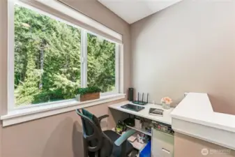 Desk tucked away on upstairs landing is the perfect spot to work