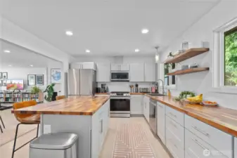 Butcher block counters and stainless steel appliances