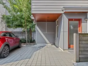 1 covered, parking spot next to unit.