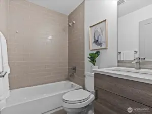 Entry level full bathroom