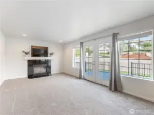 Great room w/ french doors to deck & backyard