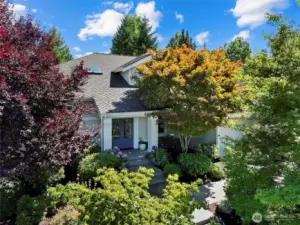 Mature trees and lush shrubbery surround the outdoor space, creating just the right amount of natural privacy for peaceful, undisturbed enjoyment.