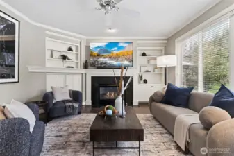 An inviting living space with backyard views creates the perfect place to relax or entertain.