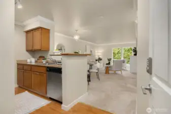 Enter into the open floor plan, contemporary condominium.