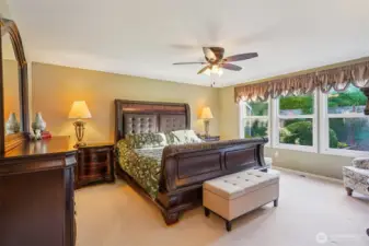 The Primary suite will accommodate your bedroom set with extra space for a private sitting area.