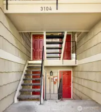 The condo is located on the second story with a reserved parking space steps from the front door.
