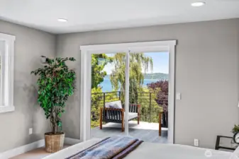 Your very own view deck off the Primary bedroom...the days area relaxing here and the sunsets are incredible.