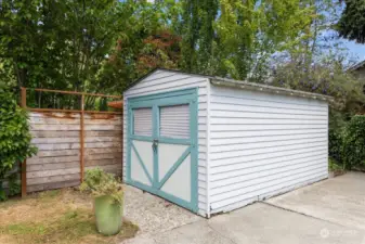 Detached garage/shed for extra storage.