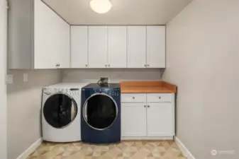 Sizable laundry room adjacent to the extreme large storage (visible in the Matterport).