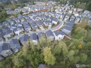 Prime lot in Greenbrooke offers a rare large yard and greenbelt privacy.