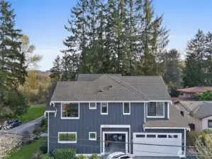 spacious 3 car garage with EV charger