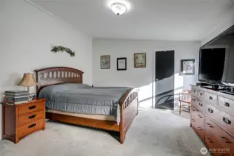 Primary suite is large with a walk in closet and private bathroom.