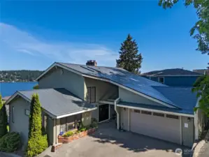 This stylish 4 bed 2.75 bath view home in the desirable Lake Forest Park neighborhood boasts an inviting light filled floor plan, designer touches, and spectacular panoramic lake, mountain, and territorial views from all levels.