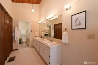 5-piece primary bath with access to walk-in closet.
