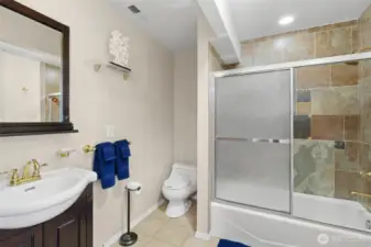 A full bath is located in the Bonus Room.  Notice gold fixtures