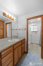 Primary bathroom has second door from hall and can double as a second guest bath.