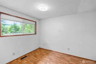 Office space can easily be converted back into a bedroom with the addition of a closet.