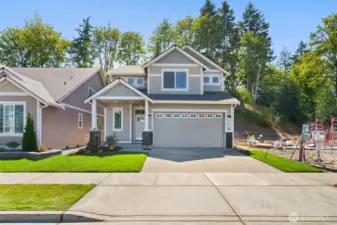 Welcome home to the Hazel on lot 57. This home offers 2611 sq ft, 5 beds, 3.5 baths with a junior suite located on the main level.
