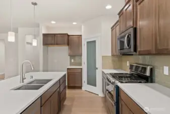 Great flow in the kitchen with the pantry located perfectly in the heart of the kitchen