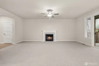 Great room features gas fireplace, for those cozy nights and a ceiling fan to keep you comfortable during the warmer months.