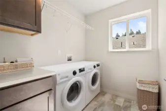 Virtually staged photo of laundry room to show off functional design