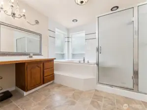 Primary Bath with Soaking Tub and Walk-in-Shower.