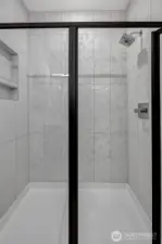 Full tile shower in primary bath (photos of lot34, same floorplan)