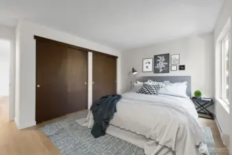 Large bedroom with two large closets. Virtually staged.