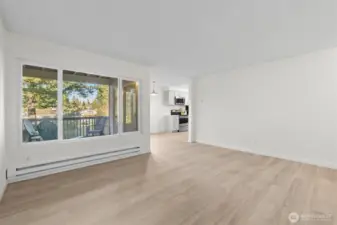 Huge window in the living room allows natural light to shine in.