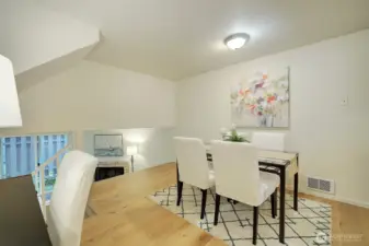 Elevated dining room has plenty of space to host your guests!