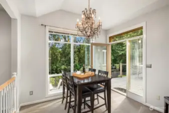 The breakfast nook also features a gorgeous chandelier.
