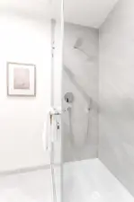 Tile flooring and shower.