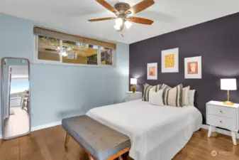 Large bedroom with oversized closet and built in shelving.