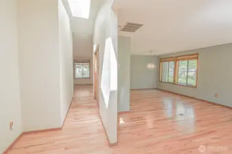 Front Entry into Family room and Dining room, Hallway Closet, and Primary Bedroom access