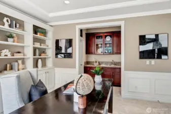 Office space has a wet-bar attached.